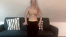 wanna groove to this crossdressing bimbo's belly dance beat?