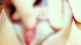 bound babe teases clit to squirting orgasm in bondage play