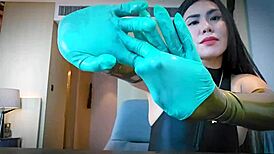 Imagine latex gloves snapping on your skin as mistress teases in rubber fetish bliss
