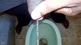 boy pees while black man watches intense urination scene