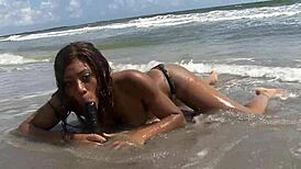 ebony babe rams dildo in fat ass publicly on florida beach