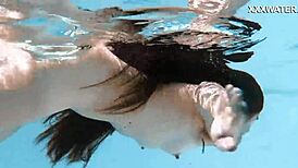 Lana the skinny Hungarian swims poolside showing juicy tits ass