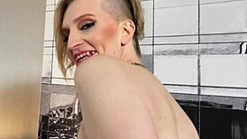 blonde shemale tgirl strokes cock and fucks ass with dildo