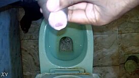 boy pees while black man watches intense urination scene