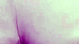 a latina couple savors their sweet cookie moment intimately at home