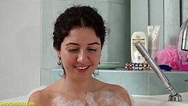 katty west soaks the bathtub fingering her tight shaved pussy to orgasm
