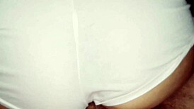 a latina couple savors their sweet cookie moment intimately at home