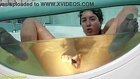 katty west soaks the bathtub fingering her tight shaved pussy to orgasm