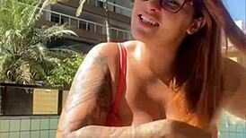 swollen pussy flashes bold on live as curvy redhead spreads wide for exhibitionist thrill