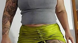 her swollen pussy stretches the tiny bikini in solo flashing tease