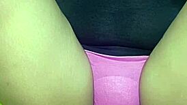 Naked housewife plays video game with huge exposed pussy on display