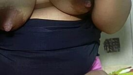 Naked housewife plays video game with huge exposed pussy on display