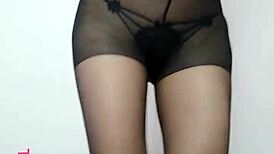 Stockinged beauty dances seductively in morning breeze