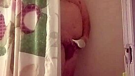 Watch Her Stroke Massive Cock in Steamy Shower Bathing Session!