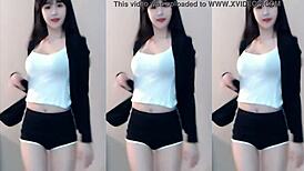 hey this cute chinese girl dances sexy on the wild coaster