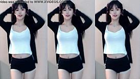 hey this cute chinese girl dances sexy on the wild coaster