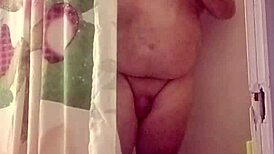 Watch Her Stroke Massive Cock in Steamy Shower Bathing Session!