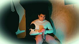 Sexy muscular bodybuilder strokes 18cm big cock in shiny white outfit camera angle 2