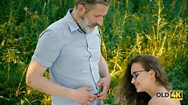 old4k handsome old man seduces busty tattooed gal for forest sex and cunilingus