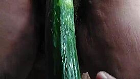 Grandma stuffs hairy pussy with huge cucumber, you believe this?!