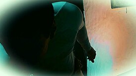 Sexy muscular bodybuilder strokes 18cm big cock in shiny white outfit camera angle 2