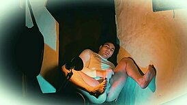 Sexy muscular bodybuilder strokes 18cm big cock in shiny white outfit camera angle 2