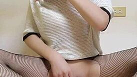 Shemale Ting Xuan grinds fishnet stockings over her ass while riding dildo to anal bliss