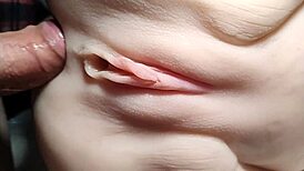 She rides double penetration toys close-up her shaved big pussy stretched wide like a fuck doll