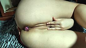 her tight anus plugs keep that wet pussy horny while she fingers herself