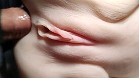 She rides double penetration toys close-up her shaved big pussy stretched wide like a fuck doll