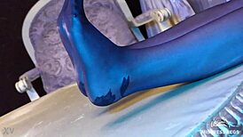 Sexy pantyhose goddess teases feet in rose print heels close-up