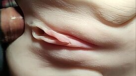 She rides double penetration toys close-up her shaved big pussy stretched wide like a fuck doll