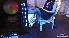 Sexy pantyhose goddess teases feet in rose print heels close-up