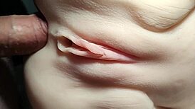 She rides double penetration toys close-up her shaved big pussy stretched wide like a fuck doll