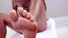 tatted tommy receives milf sandy loves sloppy footjob ass worship