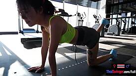 thai milf gym workout hides massive cock surprise