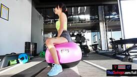 thai milf gym workout hides massive cock surprise