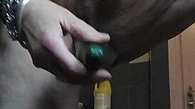 Granny Teases Hairy Spot with Cucumber Play