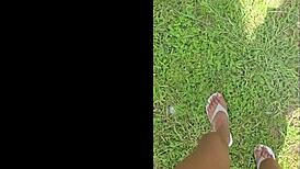 imagine giant black feet stomping tiny things in garden yard tall outdoor fetish view from below 18+