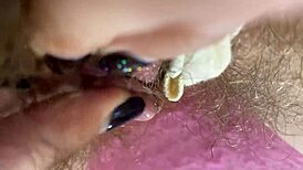 Extreme closeup of huge clit rubbed to squirting wet orgasm