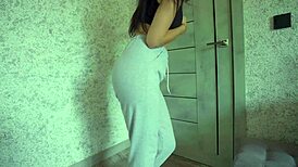 desperate student pisses sweatpants then rubs big clit pussy lips