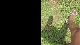 imagine giant black feet stomping tiny things in garden yard tall outdoor fetish view from below 18+