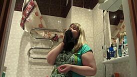 chubby milf sniffs stolen panties then stuffs them deep in her hairy pussy