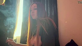 Italian milf artemisia flashes huge tits while smoking cigarette