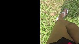 imagine giant black feet stomping tiny things in garden yard tall outdoor fetish view from below 18+