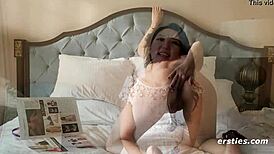 Ameliya spreads legs fingers shaved pussy clit intimately on bedroom bed