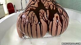 BLONDE drizzles CHOCOLATE syrup over her BIG ASS shaking it slow