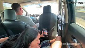 brunette gives sneaky blowjob in car on outdoor drive