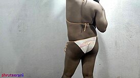 Homemade Indian shemale crossdresses micro bikini shakes big tits ass