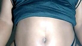 Beautiful black lady massages her huge tits so erotically!